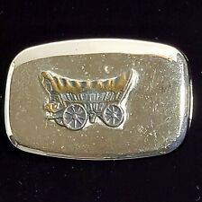 TOM CHAMBERS Western Belt Buckle Polished Metal Brass Covered Wagon Vtg USA picture