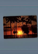 HAWAII POSTCARD T_4114 COCOPALMS SILHOUETTED IN HAWAIIN SETTING picture