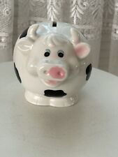 Black and White Chubby Ceramic Cow Piggy Bank picture