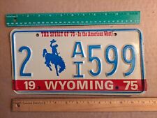 License Plate, Wyoming, 1975, 2 bucking bronco A/I 599, Yee-Haw, Ridem Cowboy picture