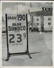 1963 Press Photo Gas price on sign outside Sunoco station in Miami, Florida picture