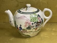 Vintage hand-painted teapot with lid. picture