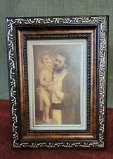 Saint Joseph and child Jesus framed desktop pic picture