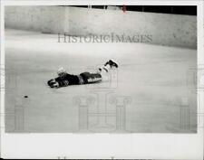 Press Photo Oswego Senior Hockey league player slides across the ice. picture