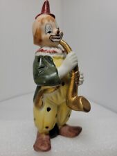 Vintage Dan Brechner Bisque Porcelain Clown Playing Saxophone by Royal Coronet picture