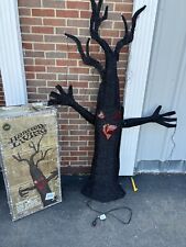 Haunted Living 61-in Freestanding Lighted Tree Door Decoration 6 Ft LED motion picture