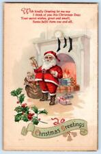 1910's SANTA CLAUS FIREPLACE GIFTS STOCKING CHRISTMAS GREETING EMBOSSED POSTCARD picture