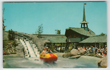 Postcard Bobsledding Down a Snow-Capped Mountain at Disneyland picture