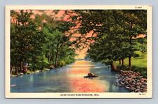Greetings from Spooner Wisconsin Postcard picture