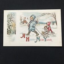 New Year Children Sled Embossed divided back unposted postcard￼￼￼￼ picture