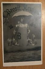 1934 Year Date RPPC Postcard With HB Beer Mug And Little Men Floating On Cloud picture