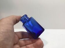 Small Rectangular Antique Cobalt Blue Cork Top Medicine Bottle. picture