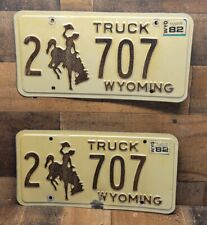 Vintage Wyoming License Plates Tags 1982 Pair Original Authentic picture
