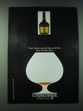 1989 Courvoisier Cognac Ad - Don't throw another log on the fire. Pour another picture