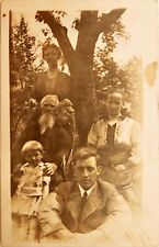 RPPC Postcard Indigenous Family Sitting Unknown Location Post Card Early 1900s  picture
