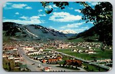 Vintage Postcard WY Jackson Aerial View Mountains Houses Shops Cars -3707 picture