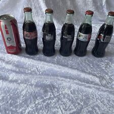 Coca Cola Bottles And Can Vintage Sports Lot picture