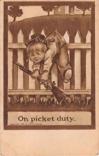 1909 Sepia-Toned Comic PC-Boy With Gun Playing Soldier Caught on Picket Fence picture