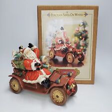Grandeur Noel Porcelain Santa On Wheels Red Car 2003 Collectors Edition with Box picture