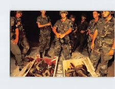 Postcard Small part of the large cache of weapons seized by US Troops Grenada picture