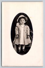 RPPC Toddler in Dress & Coat Stands in Chair AZO 1904-1918 ANTIQUE Postcard 1458 picture