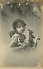 c1910 Christmas RPPC Little Girl & Toys, Teddy Bear on Horse & Doll, MW 1103/3 picture