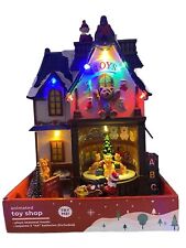 Christmas Animated LED Musical Village Toy Shop Tabletop Decoration picture