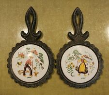 Pair of Vintage Cast Aluminum Trivets Man and Woman Farmers Dutch chickens cows picture