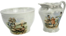 Porcelain Sugar Bowl & Creamer Depicting Children at Play from the Early 1900's, picture