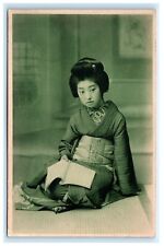 Japanese Woman Reading Japan Postcard E11 picture