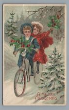 A Merry CHRISTMAS 2 Children on Bicycle Bike Vintage 1907 Postcard picture