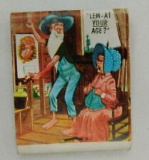 Lem-At Your Age? Hillbilly Cartoon Maddux TV Full Unstruck Vintage Matchbook Ad picture