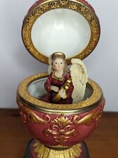 Porcelain Music Egg with Angel Playing Carol of the Bells picture