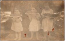 1910s RPPC Real Photo Postcard Three Children Eating Large Slices of Watermelon picture
