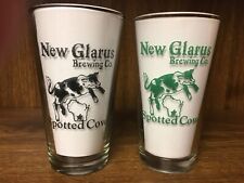 2 different colored Spotted Cow pint glasses - Black & Green picture