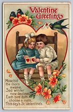 C1910 VALENTINES postcard pair of children read Valentines card heart/swallows picture