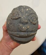 ancient 16th century antique Mexican Mayan natural stone rock face sculpture . picture