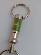 BP Green Silvertone Double Ring Keychain picture