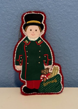Harrods Doorman Christmas Ornament Green Jacket Red Trim and Bag of Gifts picture