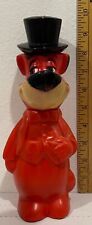 Vintage red 1960s Huckleberry Hound plastic coin bank by Hanna-Barbera picture
