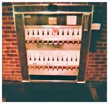 Vintage Cigarette Vending Machine still. Fully operational with blue backlight picture