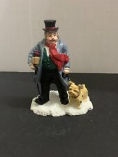 1995 Mervyns Village Square Man Holding Gift with Dog Figurine picture