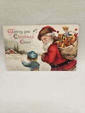 Vintage Wishing You A Merry Christmas Postcard Santa. Postmarked 1907 Embossed.  picture