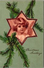 Glitter Christmas Postcard Angels Face Inside a Star Ornament Pine Tree Branch picture