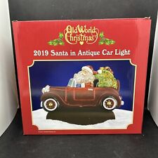 Old World Christmas 529779 Glass Blown Santa in Antique Car Light Ornament picture