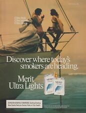 1987 Merit Cigarettes - Smoking Couple Large Sailboat Chain - Print Ad Photo picture