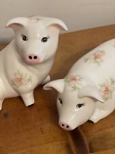 Pair Of Ceramic Pig Figurines w Pink Flowers  7 x 3 x 3 picture