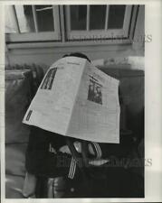 1963 Press Photo Milwaukee-A Weary sailor sleeps under a Great Lakes newspaper picture