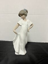 NAO BY LLADRO 1110 HOW PRETTY GIRL HOLDING DRESS PORCELAIN FIGURINE picture