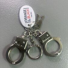 Orange is the New black Rare Promotional Novelty Faux Tiny Handcuffs keychain picture